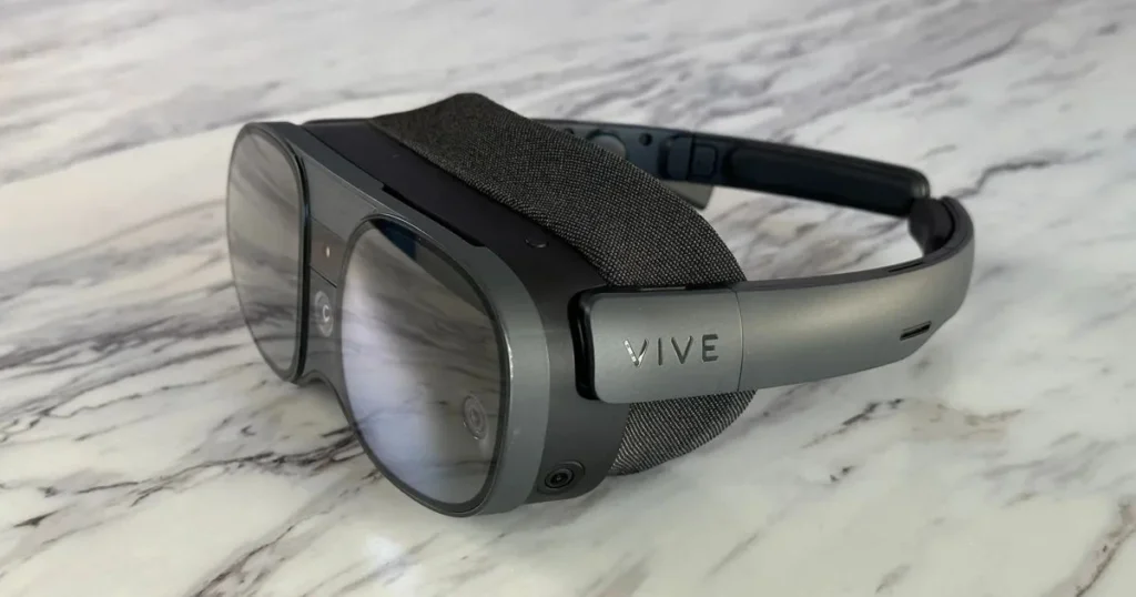 Black HTC Vive XR Elite Placed on White Textured Marble