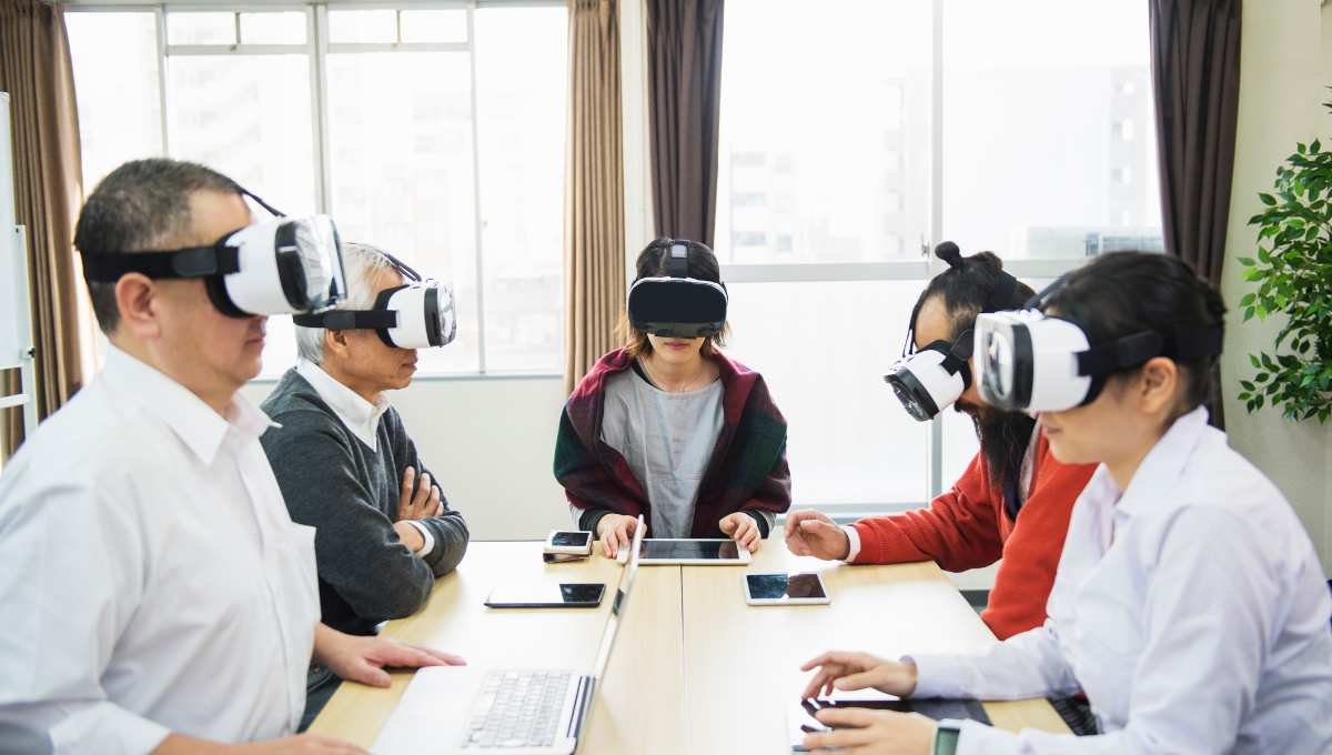 People doing virtual meeting using VR headset